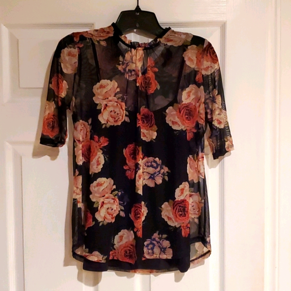 Floral sheer top with black satin camisole under